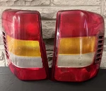 Both Tail Light Assembly-regular Tyc 11-5275-90 Fits 02-04 Jeep Grand Cherokee Used. Price: $50.00.