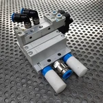 Festo VUVG-L10-M52-MT-M5-1P3 Pneumatic Solenoid Valve Manifold & 4 Rail Used. Price: $50.00.