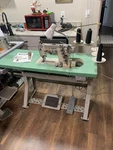 Pegasus CW500N Coverstitch Industrial Sewing Machine With Motor And Table Used. Price: $950.00.